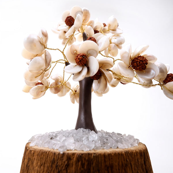 Sahara Agate decorative tree featuring 300 white Gomti chakra shells and brown rudraksha beads on a wooden base.